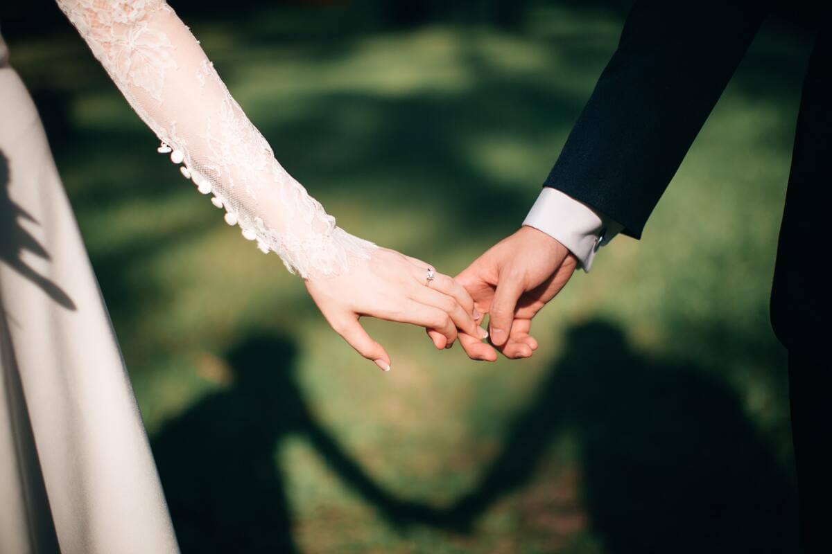 holding hands in toronto 2 Advantages and Disadvantages of Hiring a Bartender for Your Wedding